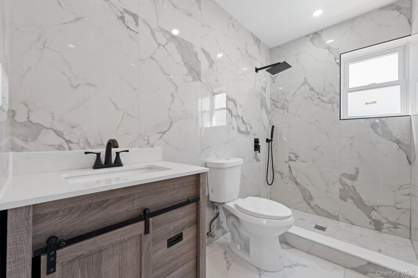 Opportunity Knocks! 148-01 133rd Avenue is a newly renovated - photo 4