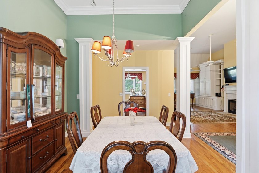 Set among mature trees on a quiet street, this brick traditional - photo 5