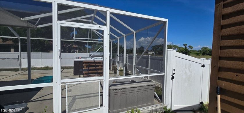 Beautiful three -bedroom, two-bathroom home featuring a covered - photo 8