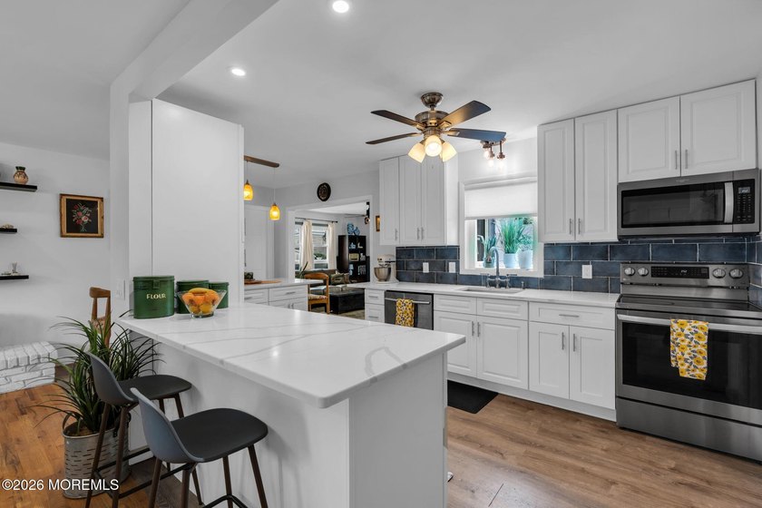 Brick's highly desirable Lake Riviera offers this expanded 3 - photo 6
