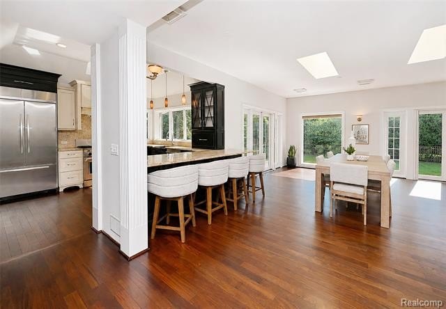 Welcome to this landmark stone home, situated on a large corner - photo 11