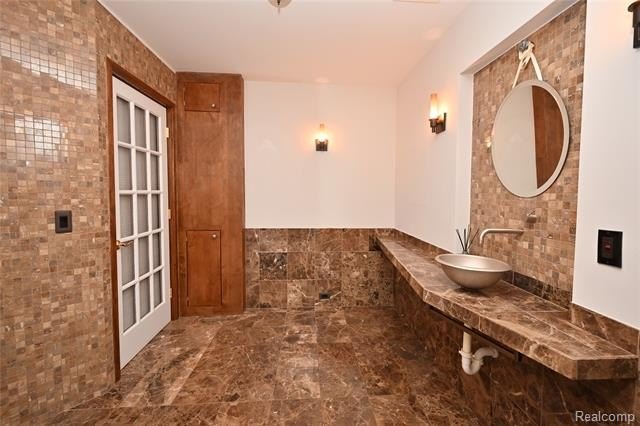 Welcome to this landmark stone home, situated on a large corner - photo 23