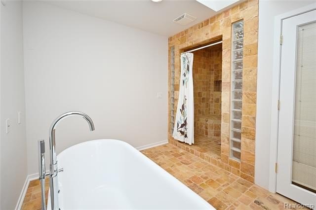Welcome to this landmark stone home, situated on a large corner - photo 29