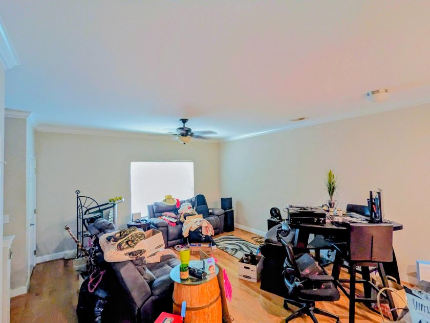 Opportunity to build equity! The open main level features - photo 4