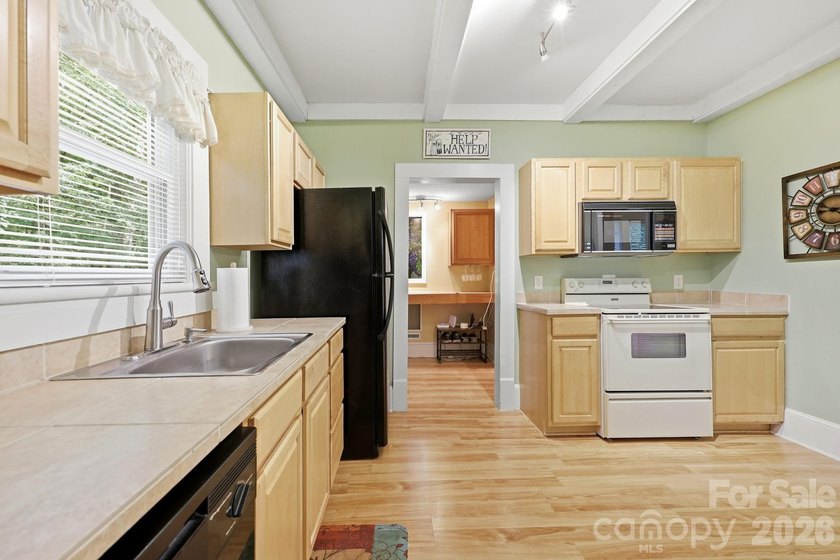 Enjoy lake living &amp; timeless character in The Sanctuary at - photo 11