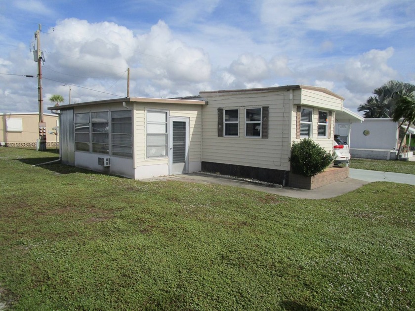 This beautiful turnkey 2 bedroom, 2 bath home is located in the - photo 3