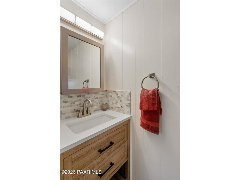 Improved Price! Enjoy low-maintenance living in this updated - photo 12