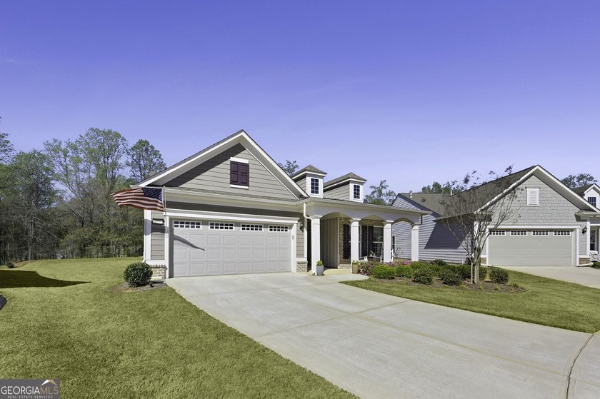 Welcome to luxury resort living in the premier 55+ gated - photo 2