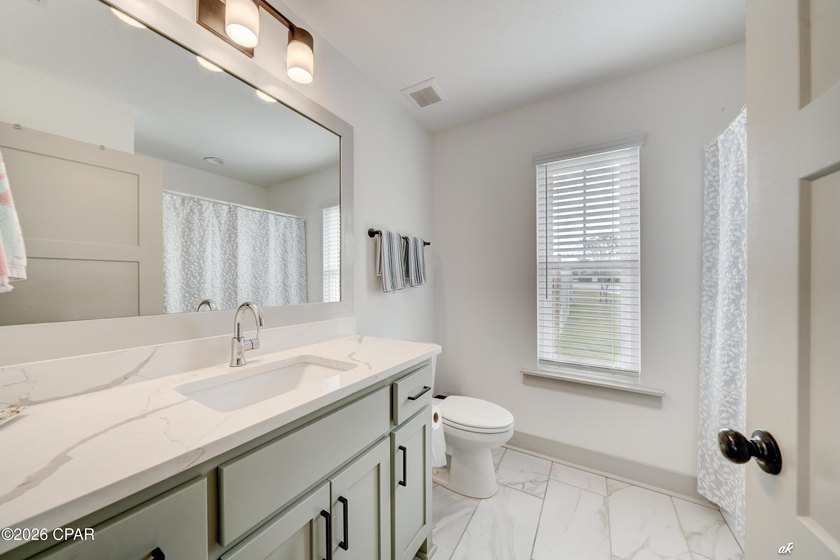 This beautifully crafted 5-bedroom, 2-bathroom home offers - photo 22