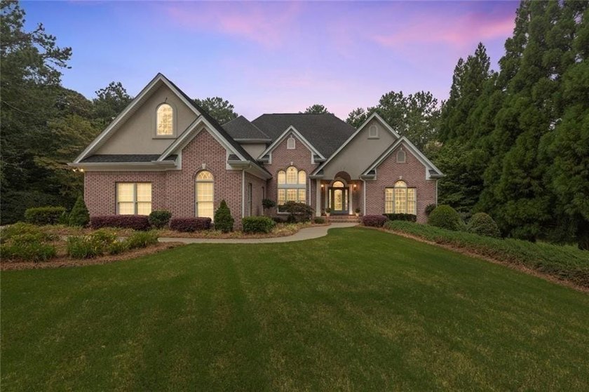 This exquisite four-sided blush brick estate is the epitome of - photo 3