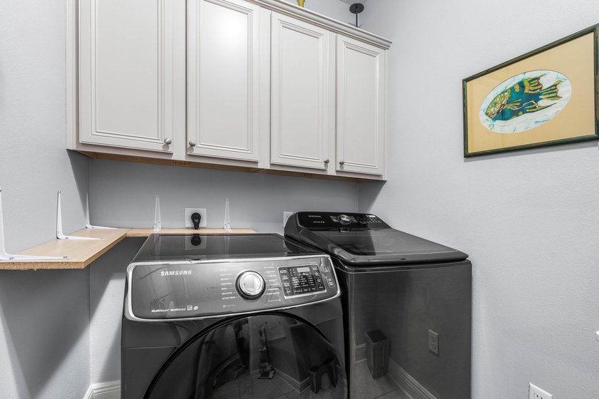 OWNED BY A CONTRACTOR WHO ADDED MANY UPGRADES. SINGLE LEVEL - photo 27