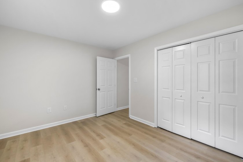 TOTALLY RENOVATED, ALL NEW KITCHEN, FRESH PAINT, NEW FLOORING - photo 33
