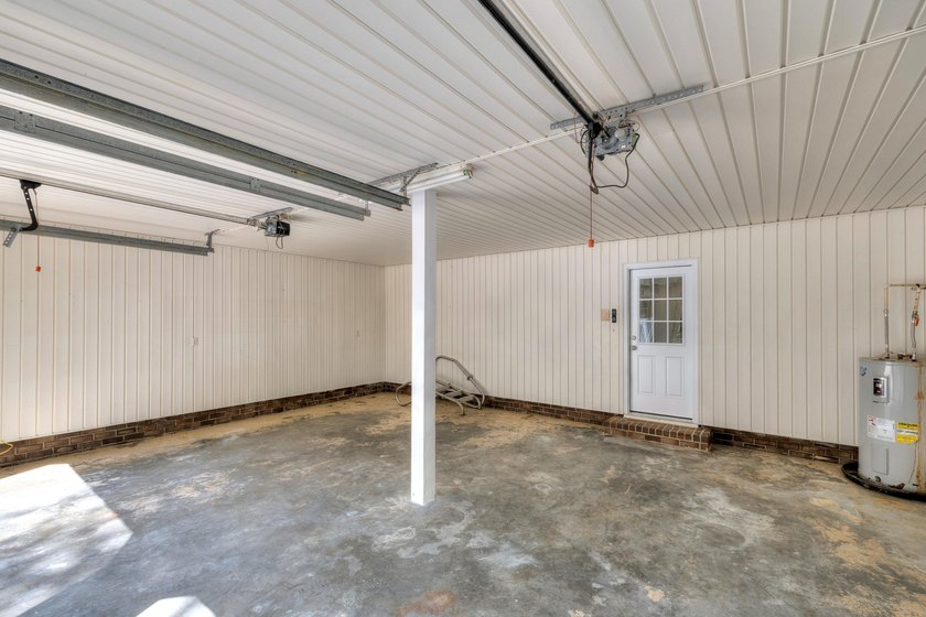 TOTALLY RENOVATED, ALL NEW KITCHEN, FRESH PAINT, NEW FLOORING - photo 39