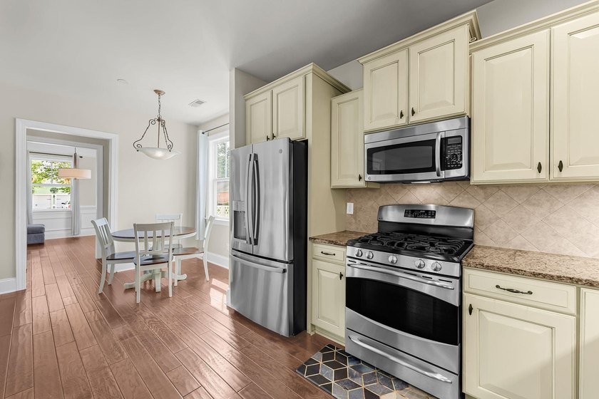 Nestled on a desirable corner lot, this beautiful two-story home - photo 6