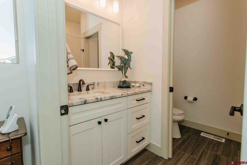 Custom-built home situated on a spacious corner lot with - photo 21