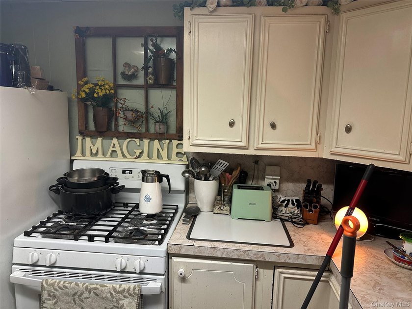 Classic Colonial Revival Opportunity in Sayville - Bring History - photo 3