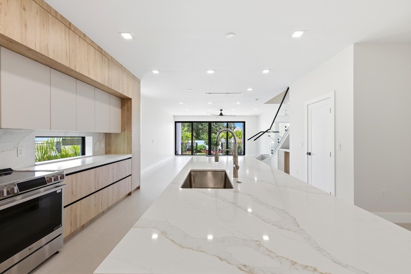 Introducing a newly built 3-bedroom, 3.5-bath luxury townhome in - photo 12
