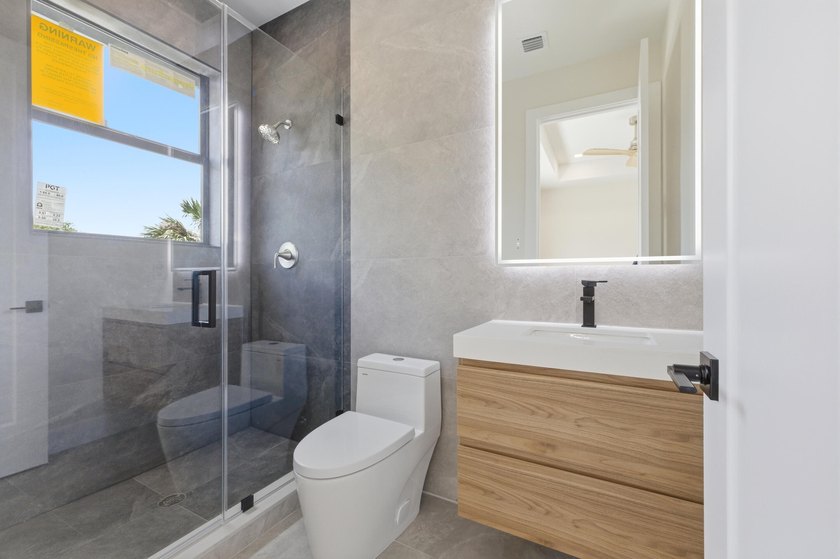 Introducing a newly built 3-bedroom, 3.5-bath luxury townhome in - photo 30