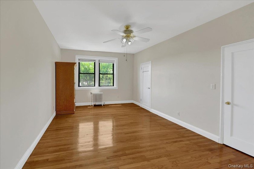 Beautiful Two-Bedroom Gem in the Heart of Pelham Manor! Located - photo 8