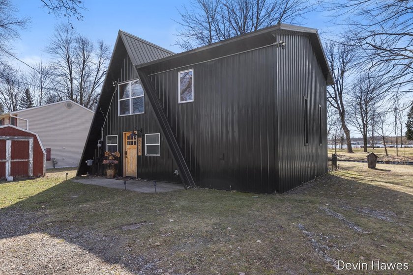 Tucked along 64 feet of private channel frontage with direct - photo 3
