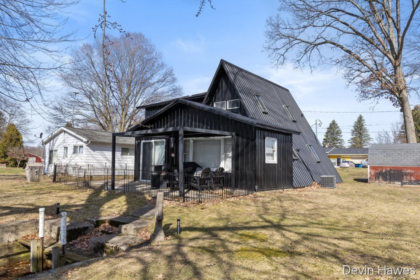 Tucked along 64 feet of private channel frontage with direct - photo 7