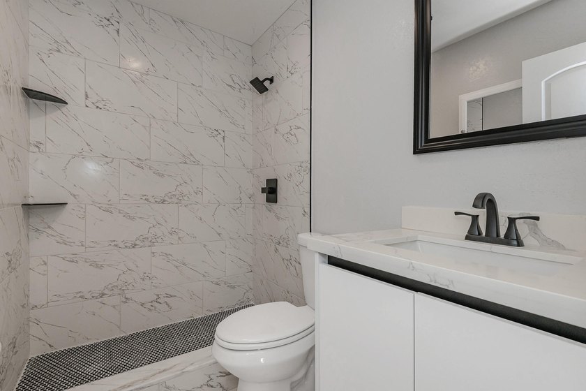 Discover this charming 3-bedroom, 2-bathroom single-family - photo 18