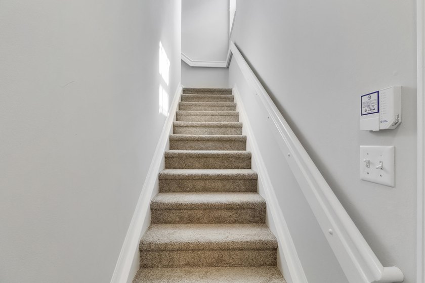 Come see this 3-bedroom, 2 bath, 1-car garage corner unit in one - photo 3