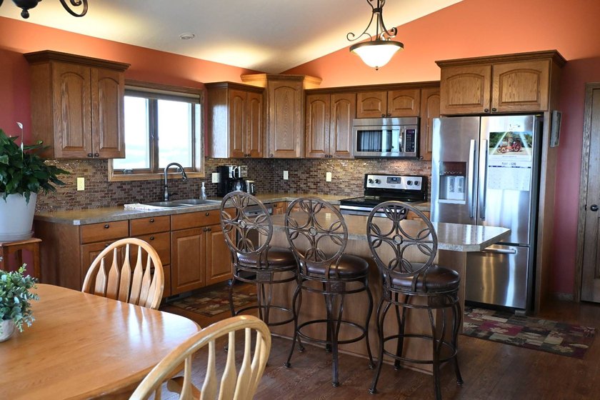 Beautiful hilltop home with incredible panoramic views of the - photo 12