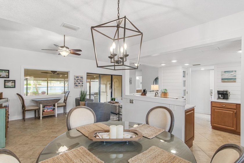 Enjoy stunning panoramic views of the lake, golf course, and - photo 13