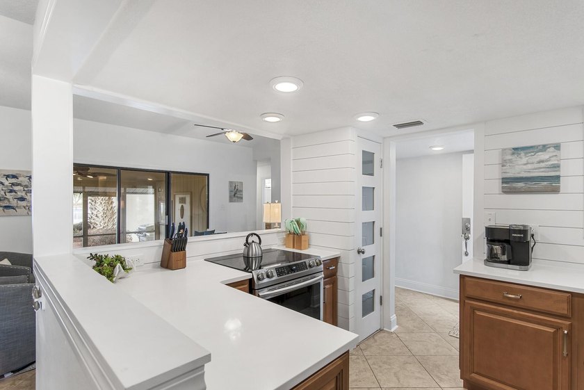 Enjoy stunning panoramic views of the lake, golf course, and - photo 14