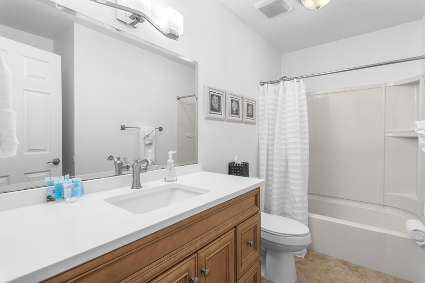 Enjoy stunning panoramic views of the lake, golf course, and - photo 15
