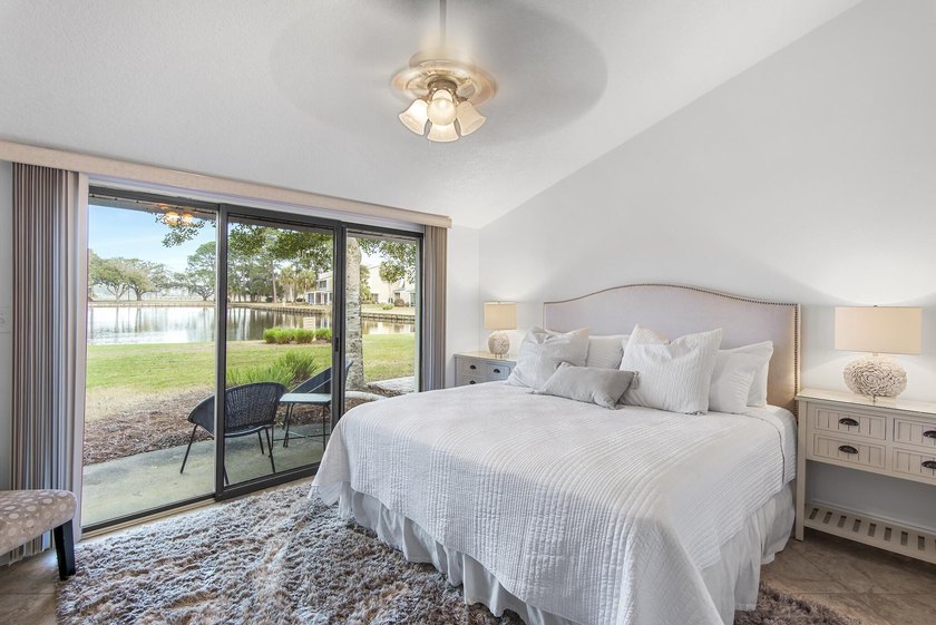 Enjoy stunning panoramic views of the lake, golf course, and - photo 18
