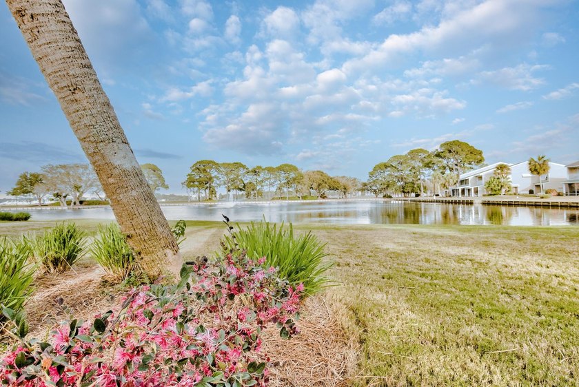 Enjoy stunning panoramic views of the lake, golf course, and - photo 37