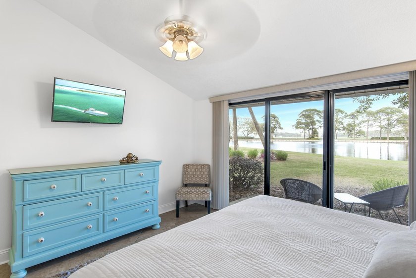 Enjoy stunning panoramic views of the lake, golf course, and - photo 39