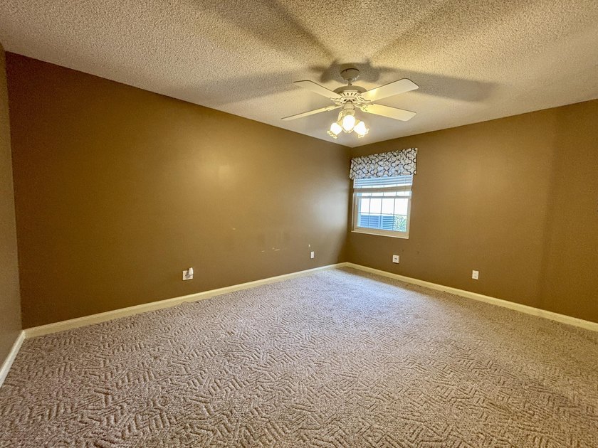 Lakefront living in the heart of St. Lucie West! This spacious - photo 20