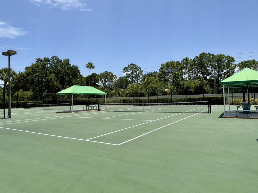 Lakefront living in the heart of St. Lucie West! This spacious - photo 30