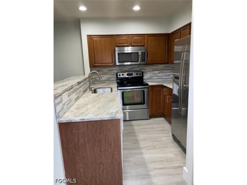 Remodeled &amp; Move-In Ready - Largest Unit in the Complex! - photo 3