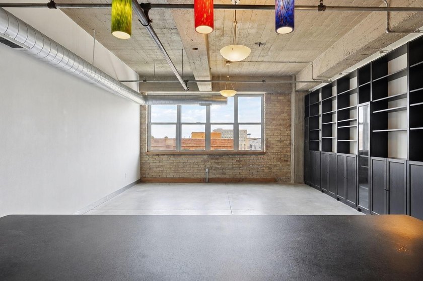 Discover authentic North Loop loft living in this bright - photo 11