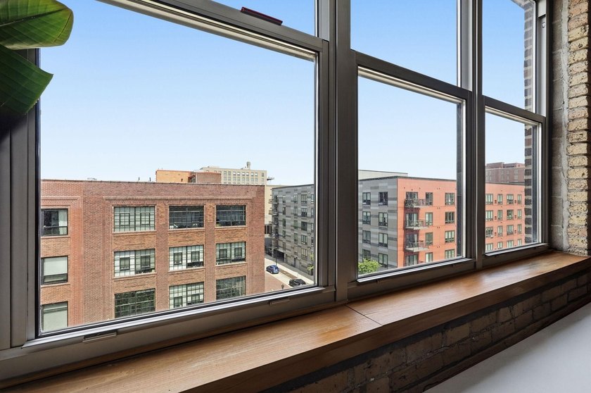 Discover authentic North Loop loft living in this bright - photo 15
