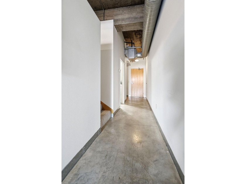 Discover authentic North Loop loft living in this bright - photo 16