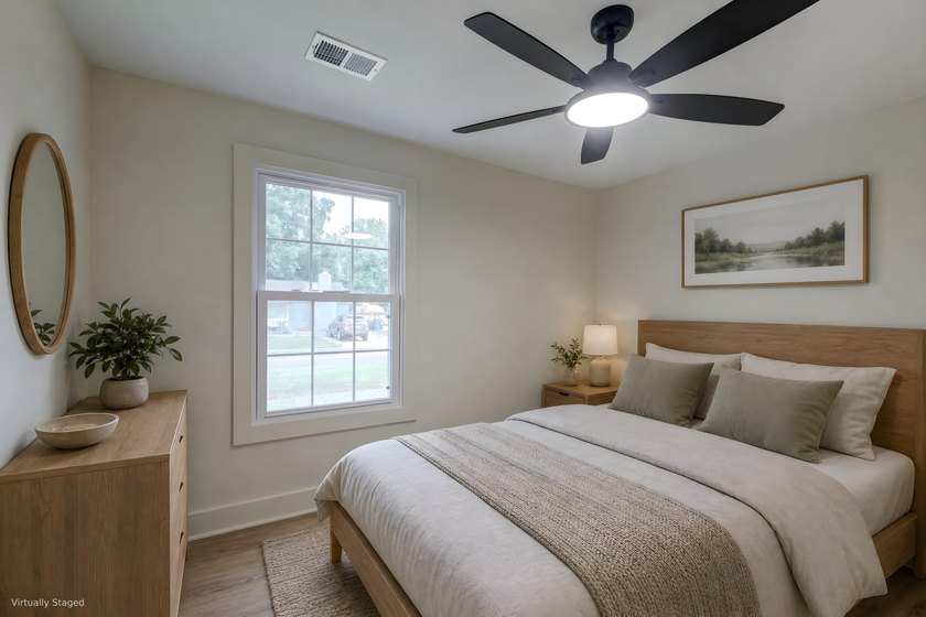Beautifully renovated brick ranch home tucked away in the heart - photo 10