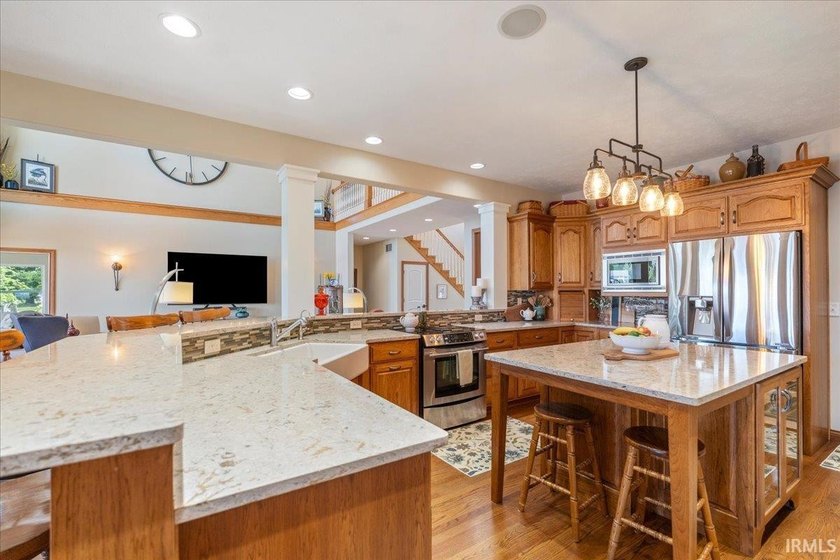 Experience exceptional lakefront living in this custom-built - photo 2