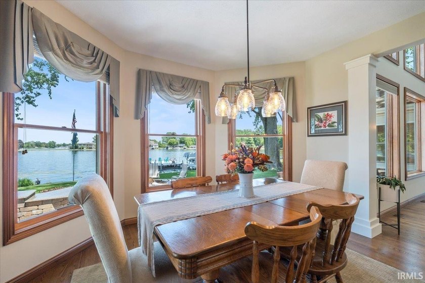 Experience exceptional lakefront living in this custom-built - photo 5
