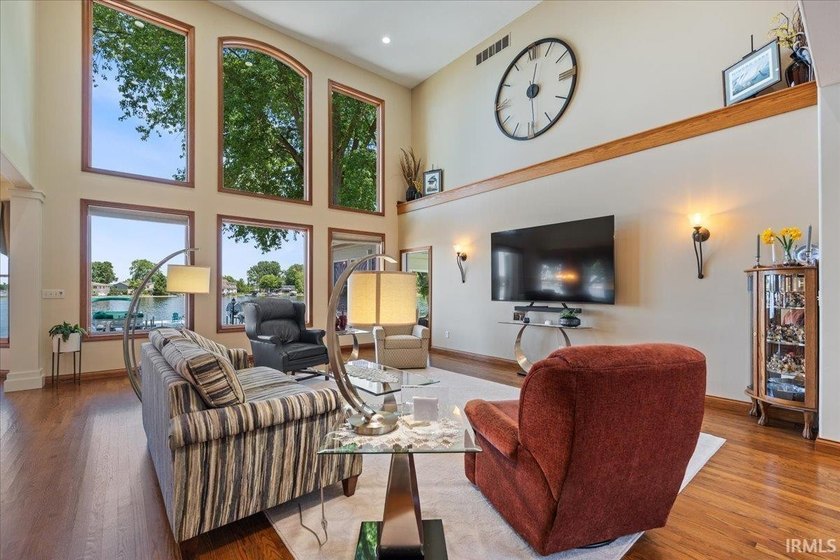 Experience exceptional lakefront living in this custom-built - photo 9