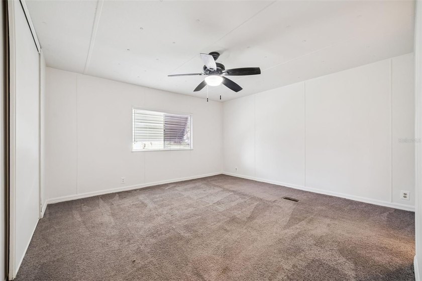 Beautifully maintained manufactured home featuring a spacious - photo 16