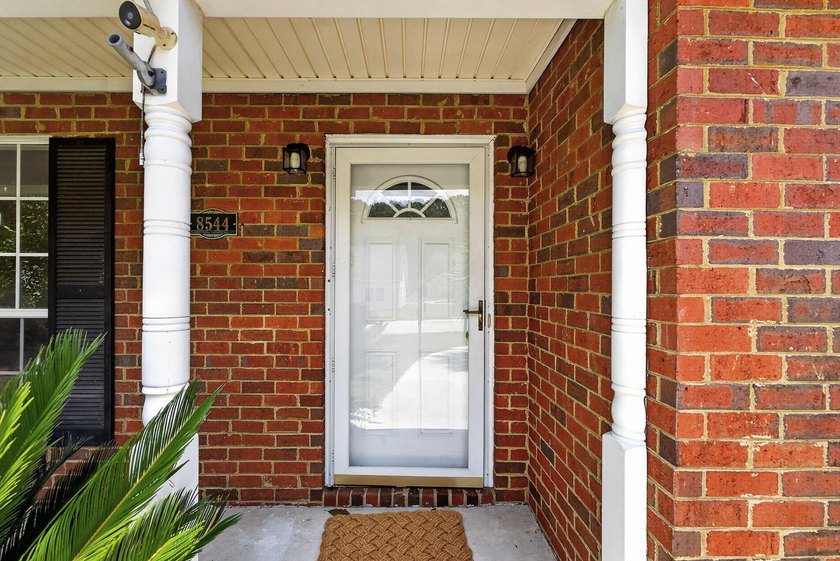 Welcome to 8544 Brookforest Drive, where easy one-level living - photo 8