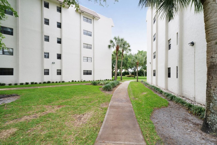 Welcome to this spacious 2-bedroom, 2-bath condo in the - photo 3