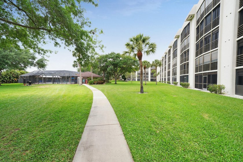 Welcome to this spacious 2-bedroom, 2-bath condo in the - photo 4