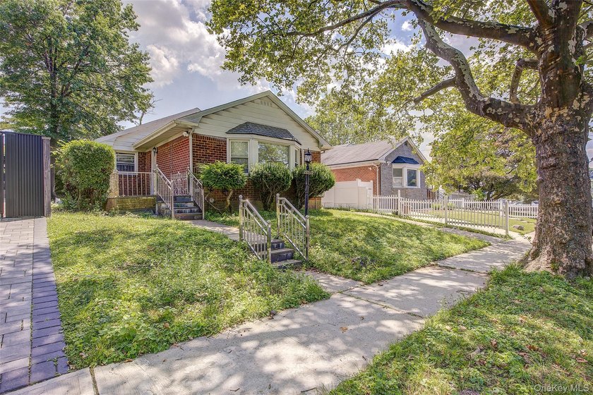 Welcome to 227-12 53rd Avenue, a remarkably spacious ranch - photo 2
