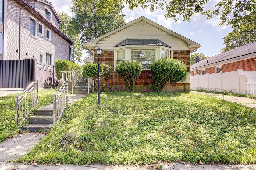 Welcome to 227-12 53rd Avenue, a remarkably spacious ranch - photo 3